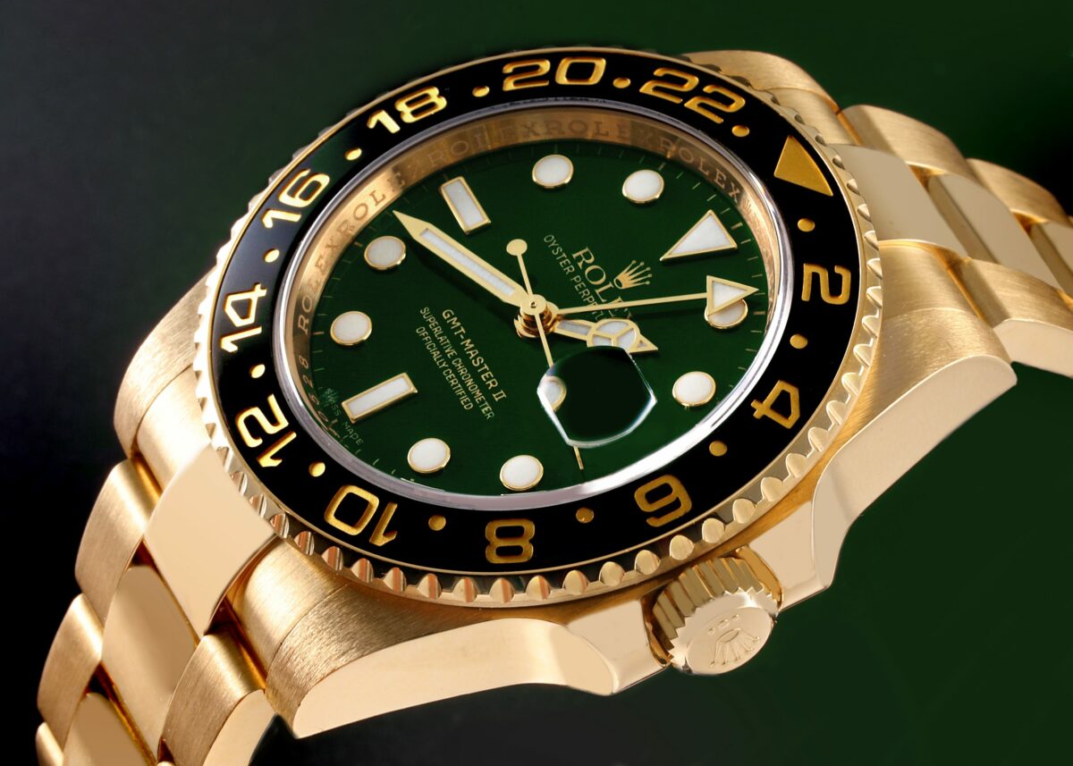 Rolex GMT-Master II Yellow Gold Green Dial Mens Watch 116718LN